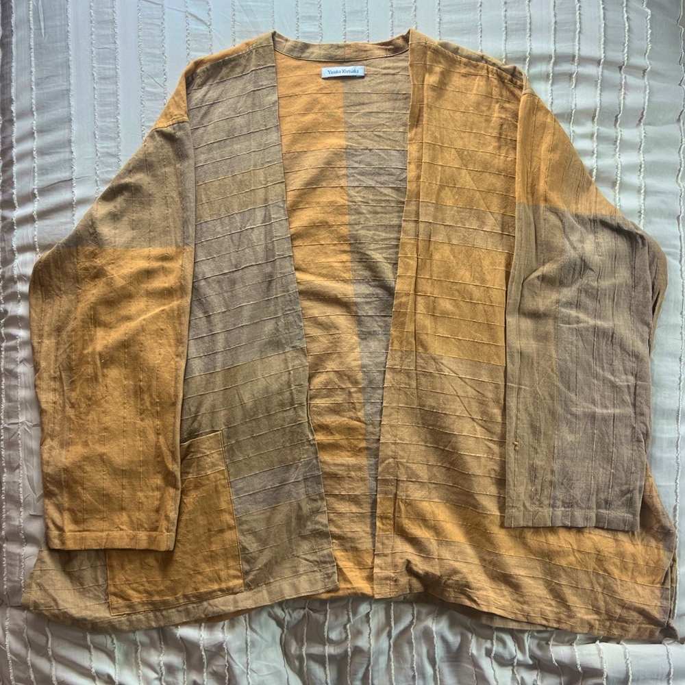 100% cotton Yasuko Kurisaka pullover jacket. Neutral yellow and brown colors.